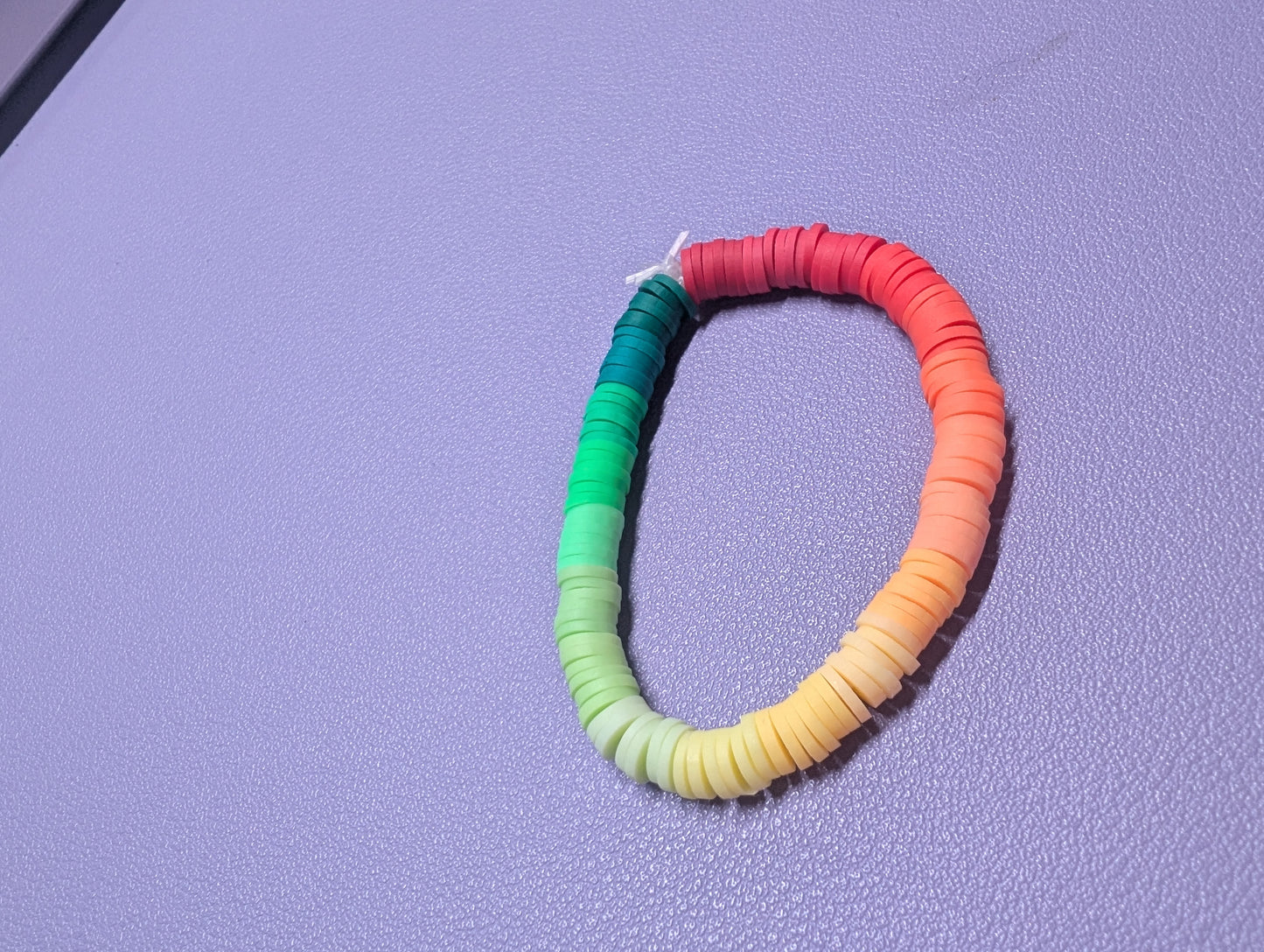 Arc - en - ciel / Perle plate